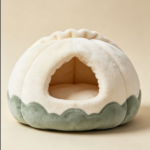 CW083 cream and green dome-shaped cat cave bed with round front entrance`