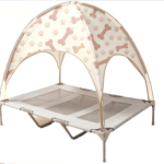 CW112 double canopy elevated pet cot in a realistic pet-use scene